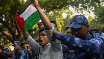 الشرطة الهندية تعتقل متظاهراً متضامناً مع فلسطين (Getty)