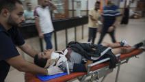 جريح في مستشفى في غزة (حاتم موسى/ أسوشييتد برس)