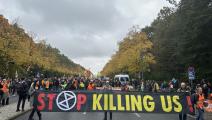 احتجاج لناشطين مناخيين في برلين، 28 أكتوبر 2023 (إربل باساي/الأناضول)