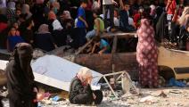 فلسطينيون في قطاع غرة وسط العدوان الإسرائيلي (محمد الهمص/ فرانس برس)