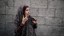 امرأة فلسطينية وسط الحرب الإسرائيلية على غزة (بلال خالد/ الأناضول)
