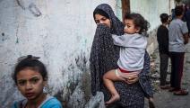 نساء فلسطينيات وسط الحرب على غزة (محمد عابد/ فرانس برس)