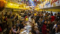 إفطار جماعي سنوي في حي المطرية بالقاهرة (محمود الخواص/Getty)