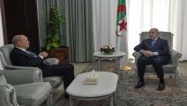 الرئيس الجزائري ووزير الخارجية الفرنسي (رياض كرامدي/فرانس برس)