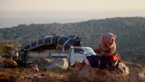 المرأة السورية تعاني الأمرين بسبب القصف والنزوح (Getty)
