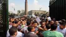 طلاب أمام جامعة القاهرة- الأناضول