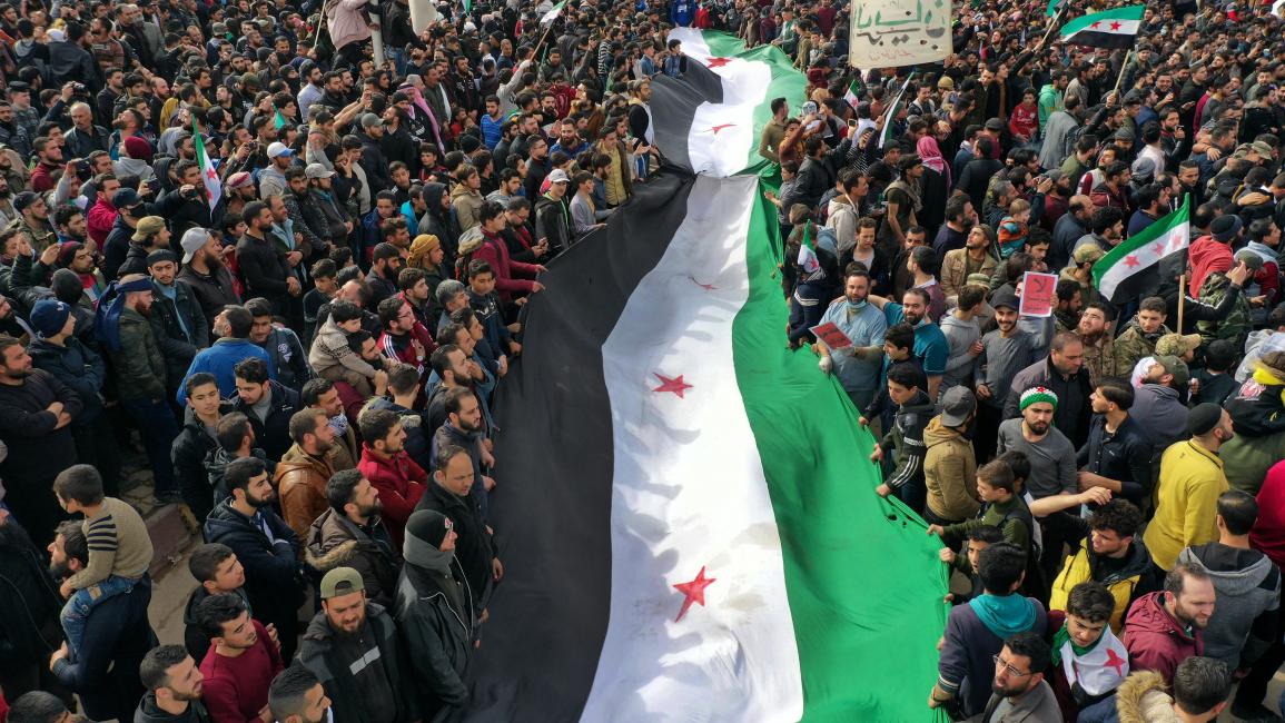مظاهرة في إدلب ضد النظام السوري في 15/ 3/ 2021 (فرانس برس)