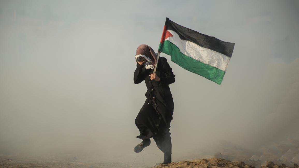 فلسطينية خلال احتجاج ضد قوات الاحتلال الإسرائيلي في خان يونس في 1/6/2019 (Getty)