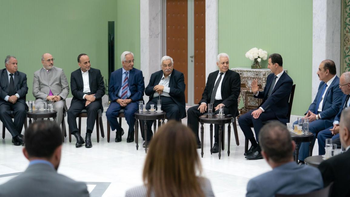 بشار مع أعضاء وفد المؤتمر القومي العربي 