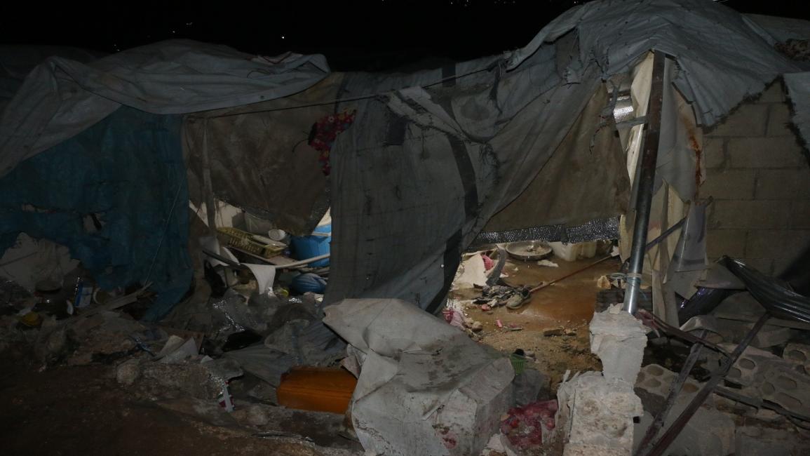 آثار قصف النظام لمخيم قاح في إدلب (محمود عبدالله/الأناضول()