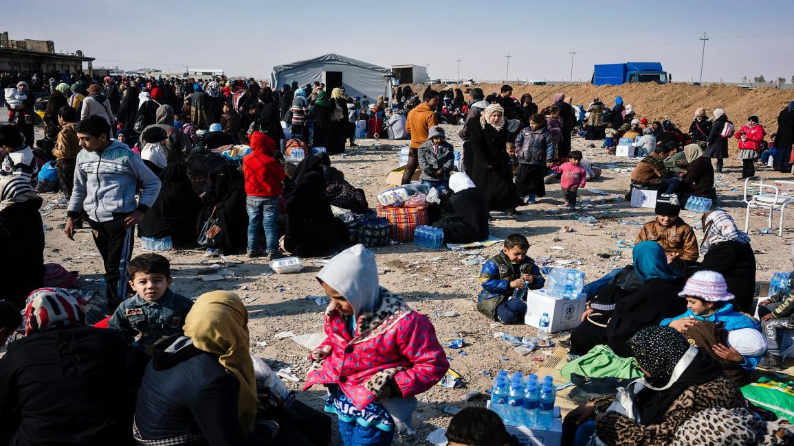 العراق-مجتمع- نازحون من الموصل (ديميتار دولكوف/فرانس برس)