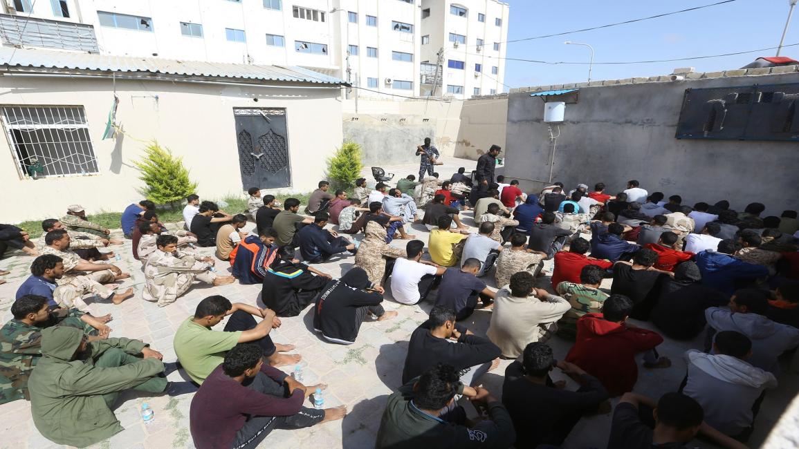 عشرات الموقوفين في طرابلس منذ بدء الاشتباكات(محمد تركية/فرانس برس)