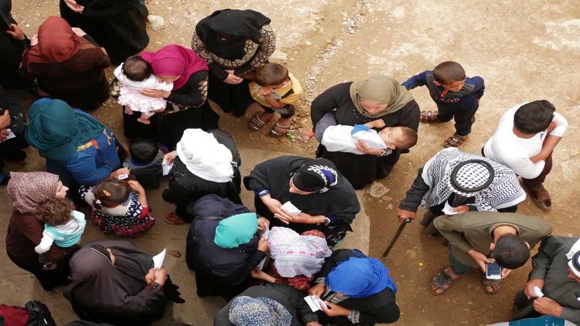 مواطنون في الموصل/ مجتمع (جنى كافوجسكا/ Getty)