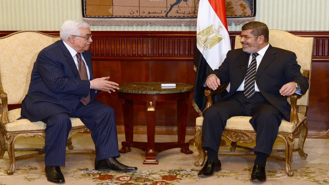 محمود عباس ومحمد مرسي