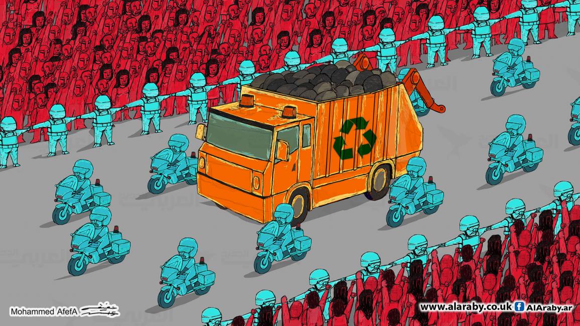 كاريكاتير موكب النفايات / ابو عفيفة