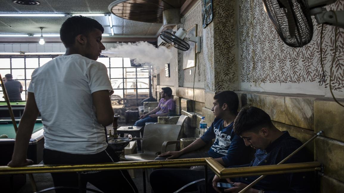المقاهي في العراق (أليكس بوتر/Getty)