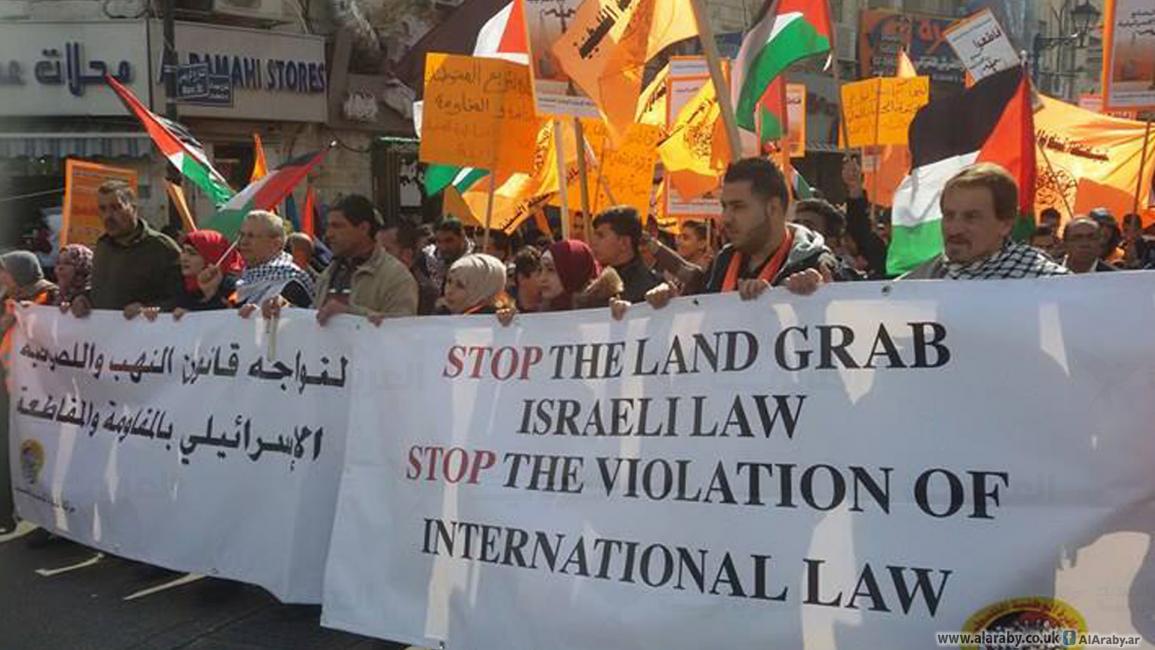 لسطينيون يدعون للتصدي لقانون "التسوية" 