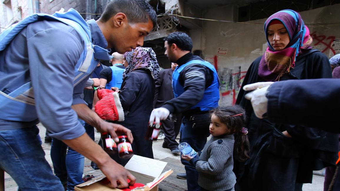 مساعدات في جنوب دمشق - فرانس برس