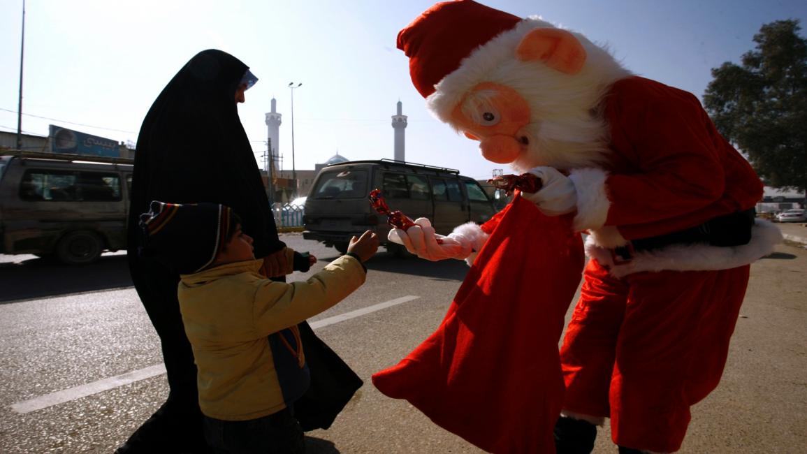 مظاهر خجولة لأعياد الميلاد في العراق (فرانس برس)