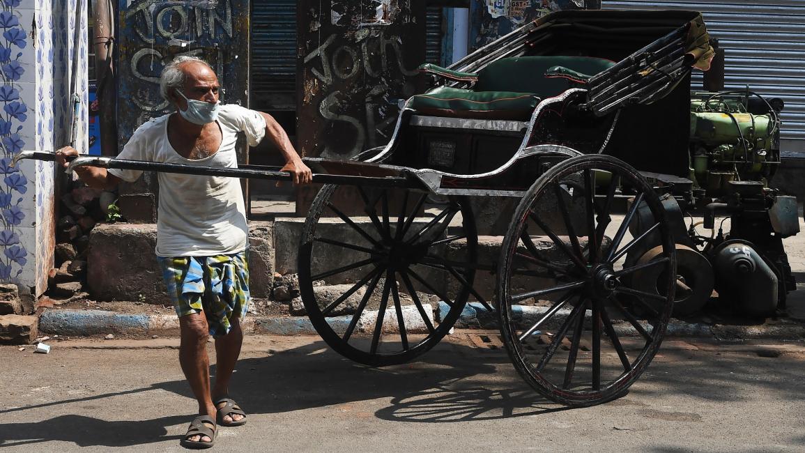 عامل هندي في كلكوتا 1 - الهند - مجتمع