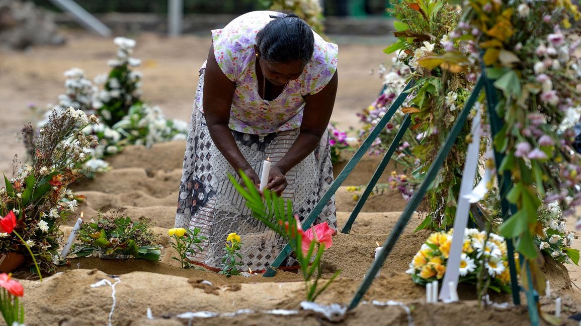 أزهار وشموع لأرواح ضحايا التفجيرات في سريلانكا(إيشارا كوديكارا/فرانس برس)