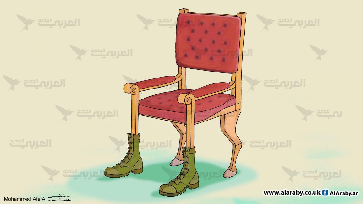 كاريكاتير الكرسي / ابو عفيفة