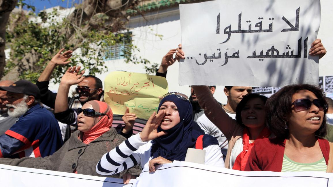 عائلات شهداء الثورة التونسية/غيتي/ مجتمع