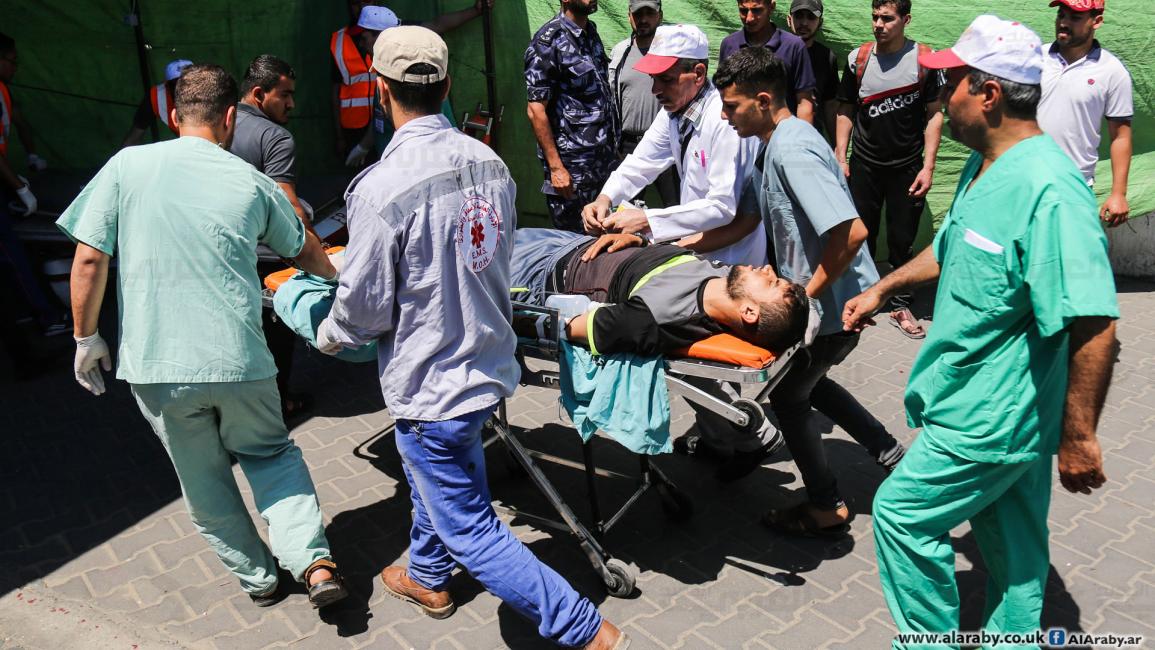 توافد المصابين على مستشفى الشفاء في غزة (عبدالحكيم أبورياش)