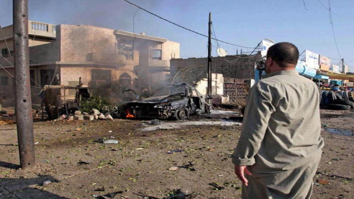 تفجير سيارة في بغداد (رضا حميد/فرانس برس)