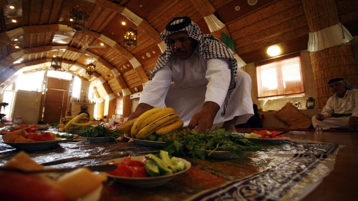 مأدبة طعام في العراق/مجتمع (حيدر حمداني/ فرانس برس)
