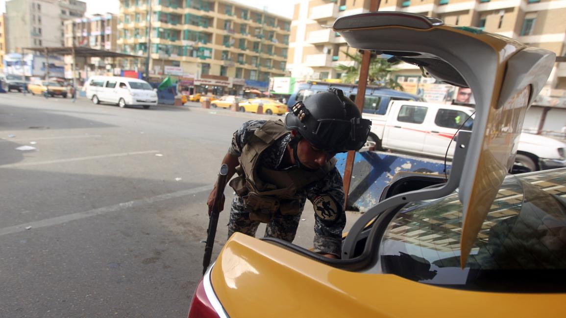 نقطة تفتيش في بغداد(أحمد الربيعي/فرانس برس)