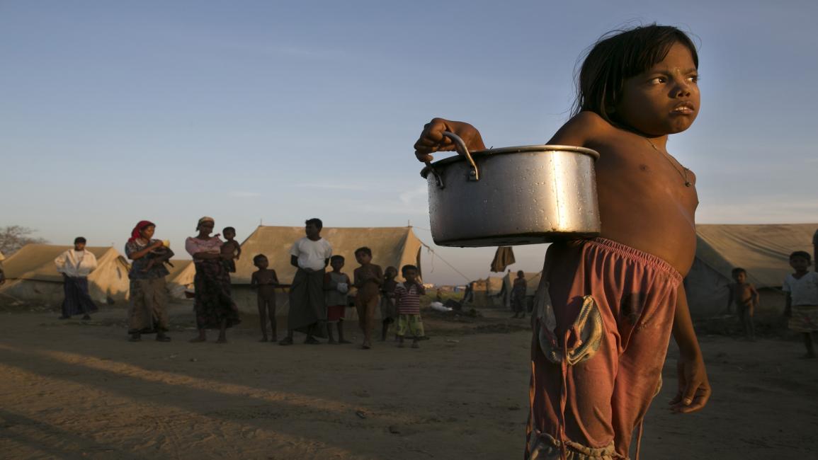 جوع وسوء تغذية بين أطفال الروهينغا في بورما(باولا برونشتاين/Getty)