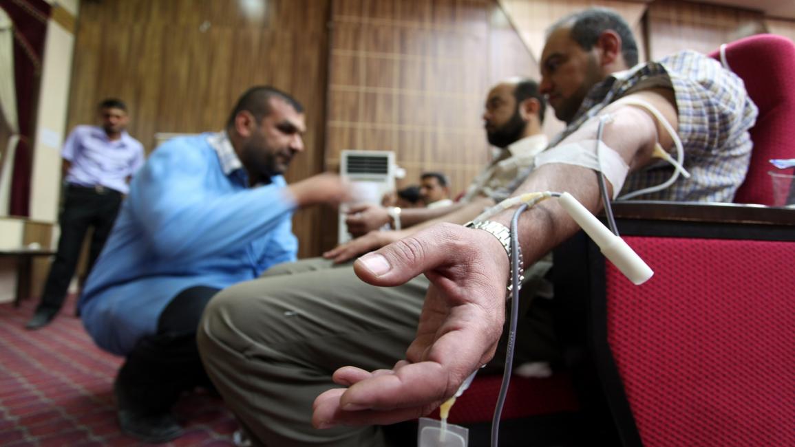 عراقيون وتبرع بالدم - العراق - مجتمع