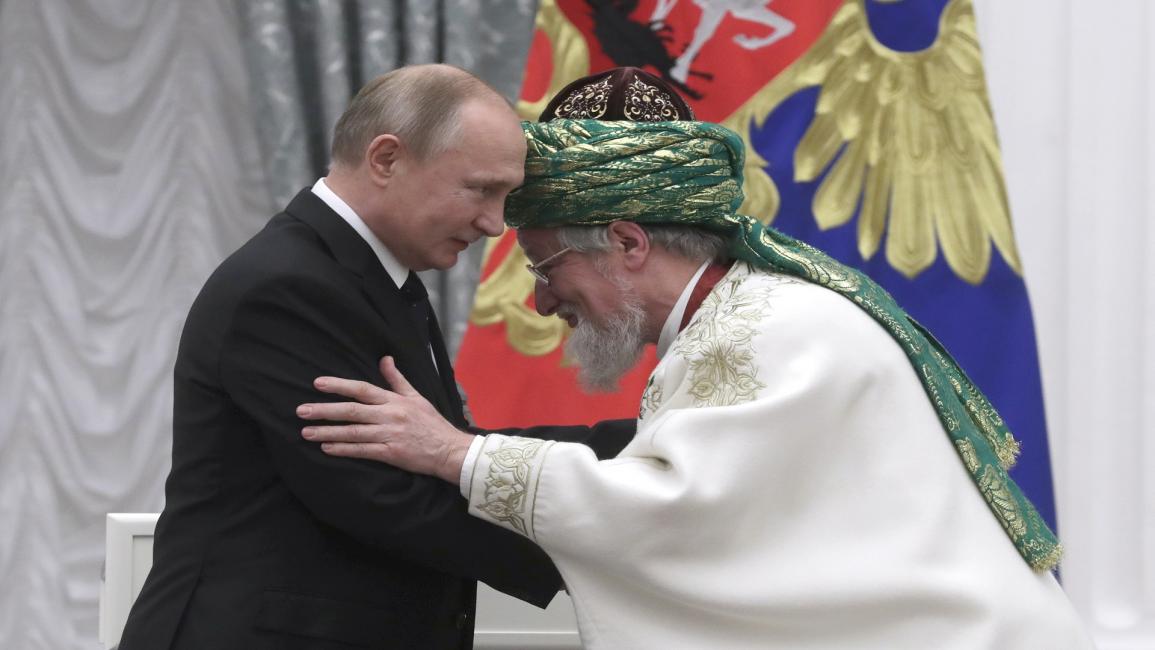 الرئيس الروسي مع المفتي الأكبر- Getty