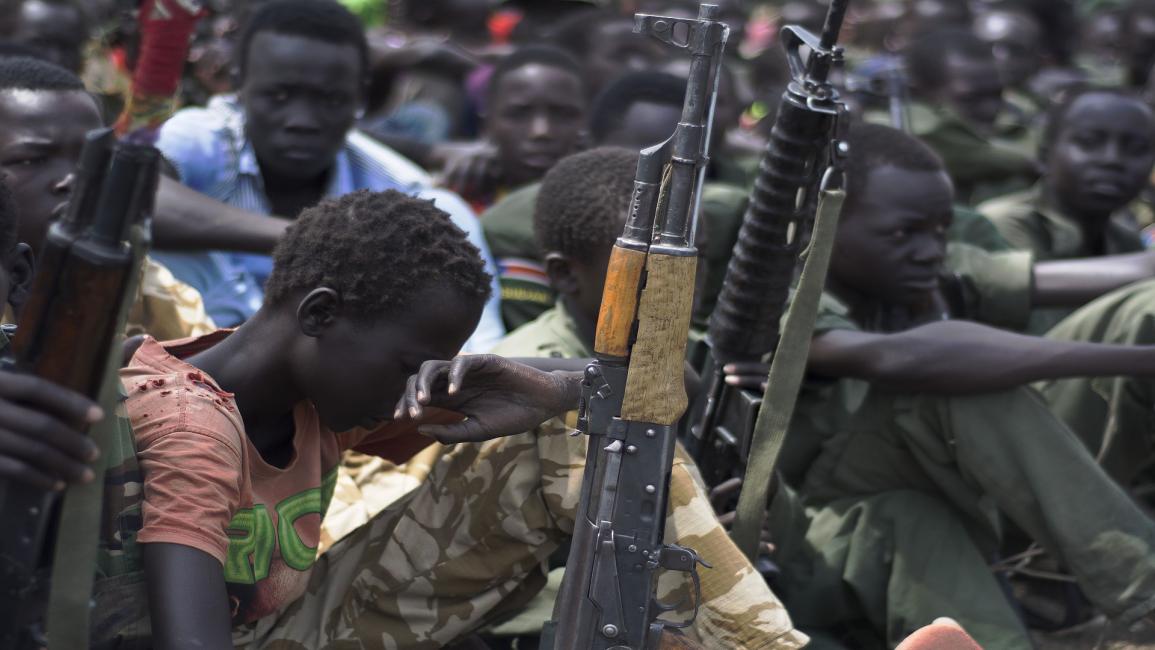 تجنيد الأطفال في جنوب السودان (تشارلز لومودونج/فرانس برس)