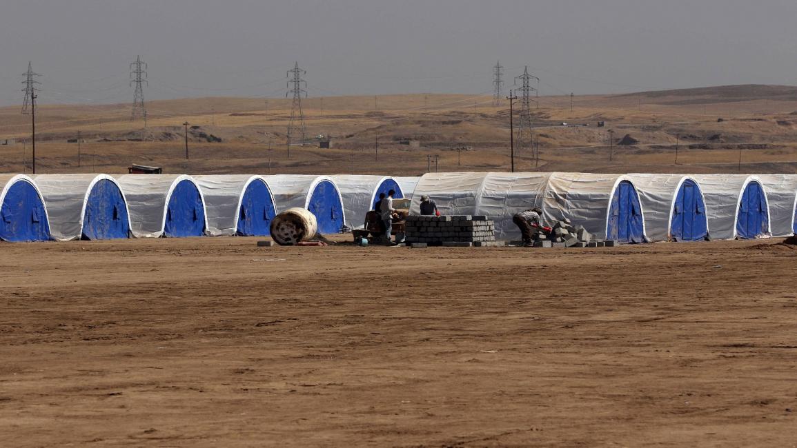 العراق- مجتمع- بناء مخيمات شرق الموصل(صفين حامد- فرانس برس)