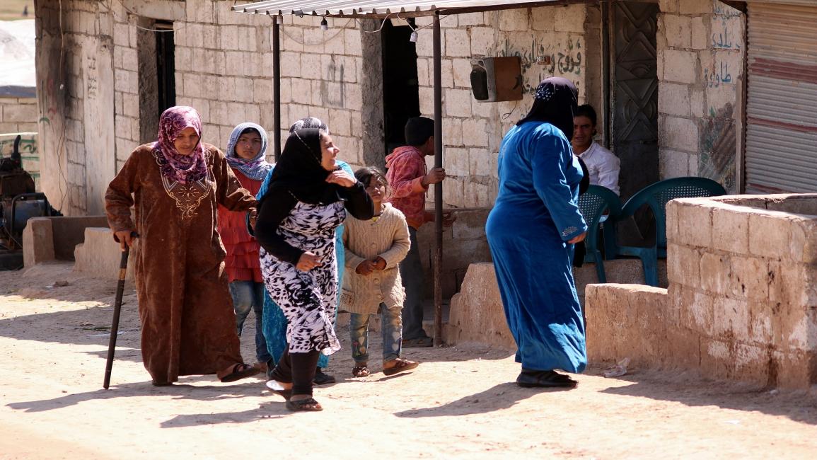 نساء سوريات في ريف إدلب(بوراك ميللي/الأناضول)