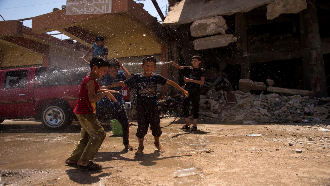 أطفال في الموصل - فرانس برس