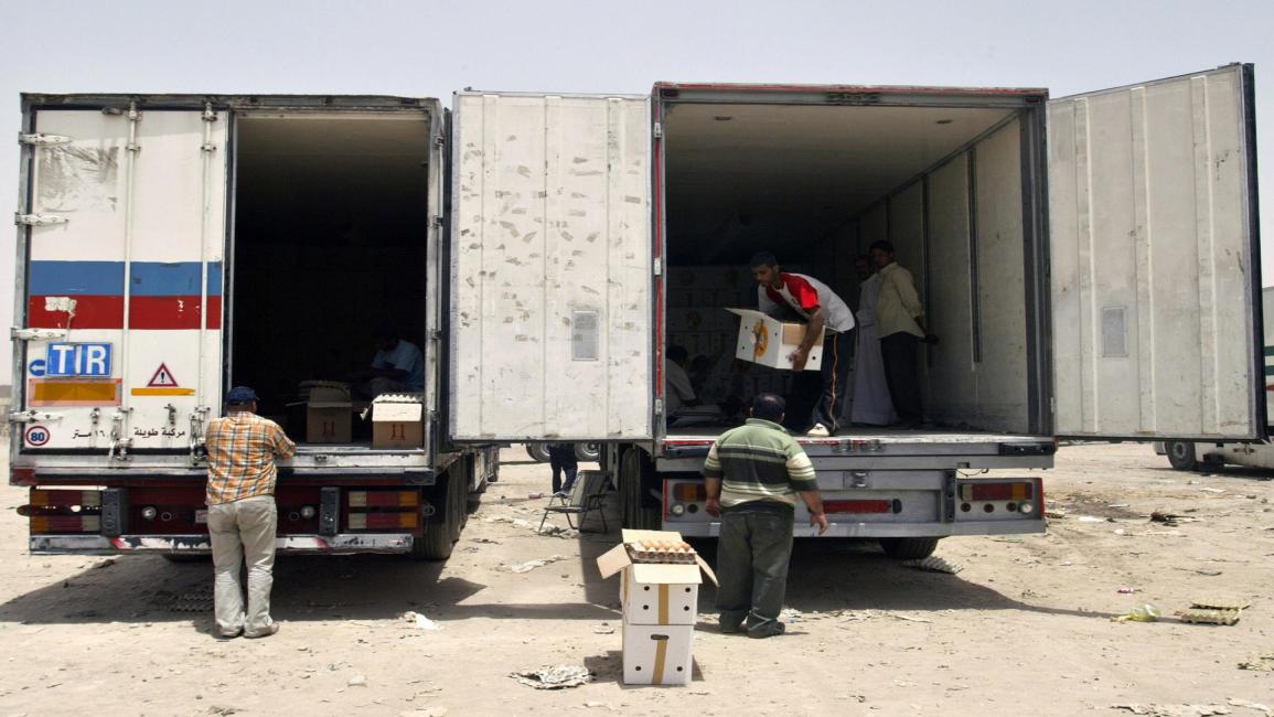 العراق-مجتمع- شاحنات غذاء(علي يوسف- فرانس برس)