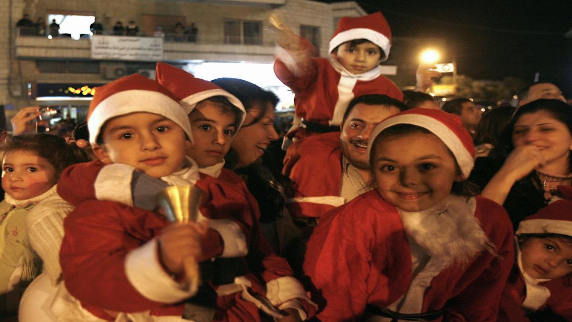 الميلاد في الأردن 1/مجتمع (عوض عوض/ فرانس برس)