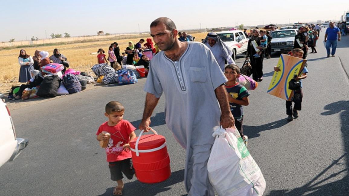العراق-مجتمع-نازحون هاربون من داعش -10-05