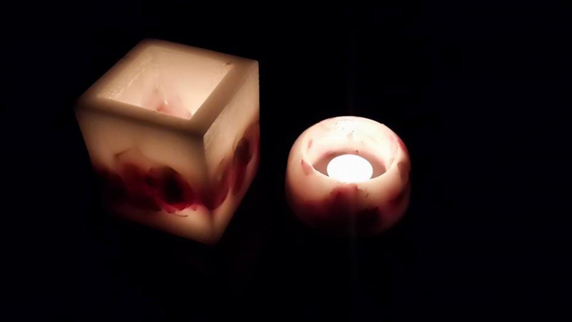 فلسطينية تبدع في تصاميم الشموع اليدوية