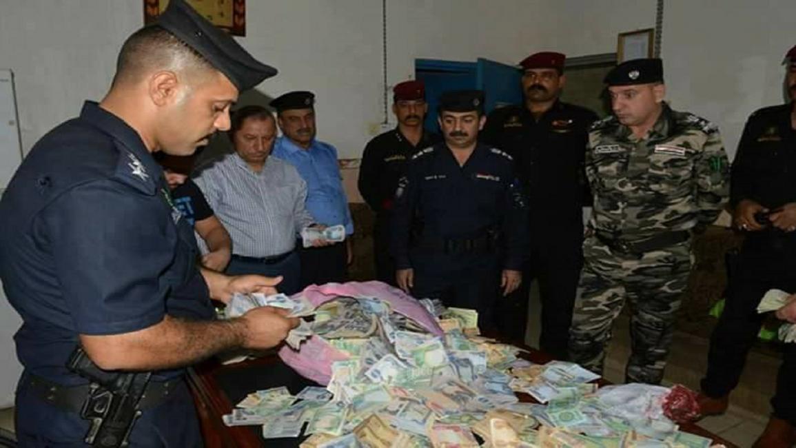 الشرطة العراقية تضبط أموالا بغرفة متسولة متوفاة(وزارة الداخلية العراقية)
