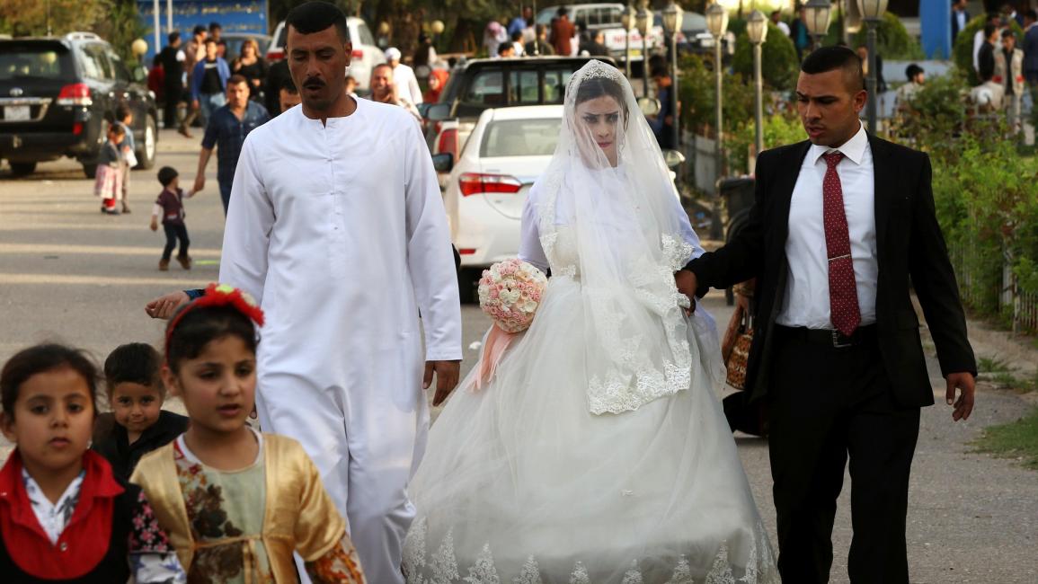 عروسان عراقيان وزفاف - العراق - مجتمع