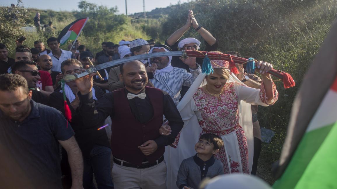 من طقوس الزواج في فلسطين (برونو ثيفينين/Getty)