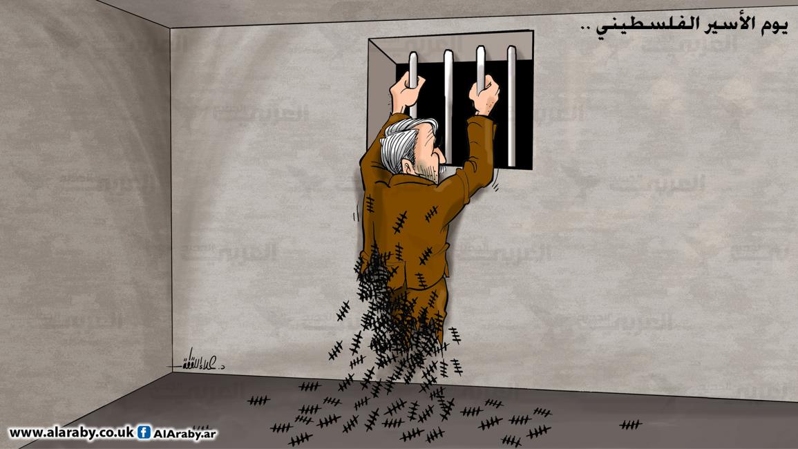 كاريكاتير يوم الاسير / علاء
