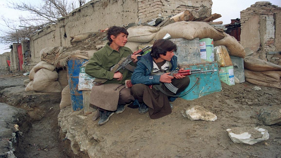 طفلان مجندان في أفغانستان( فرانس برس/GETTY)