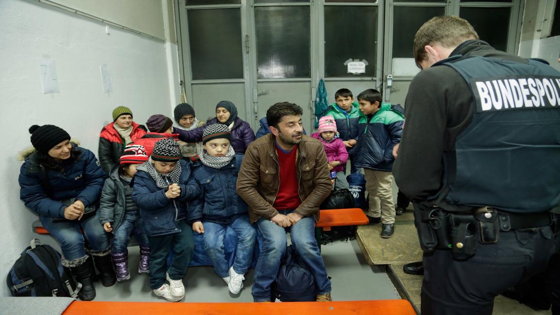 طالبو لجوء سوريون في ألمانيا (يوهان سيمون/Getty)