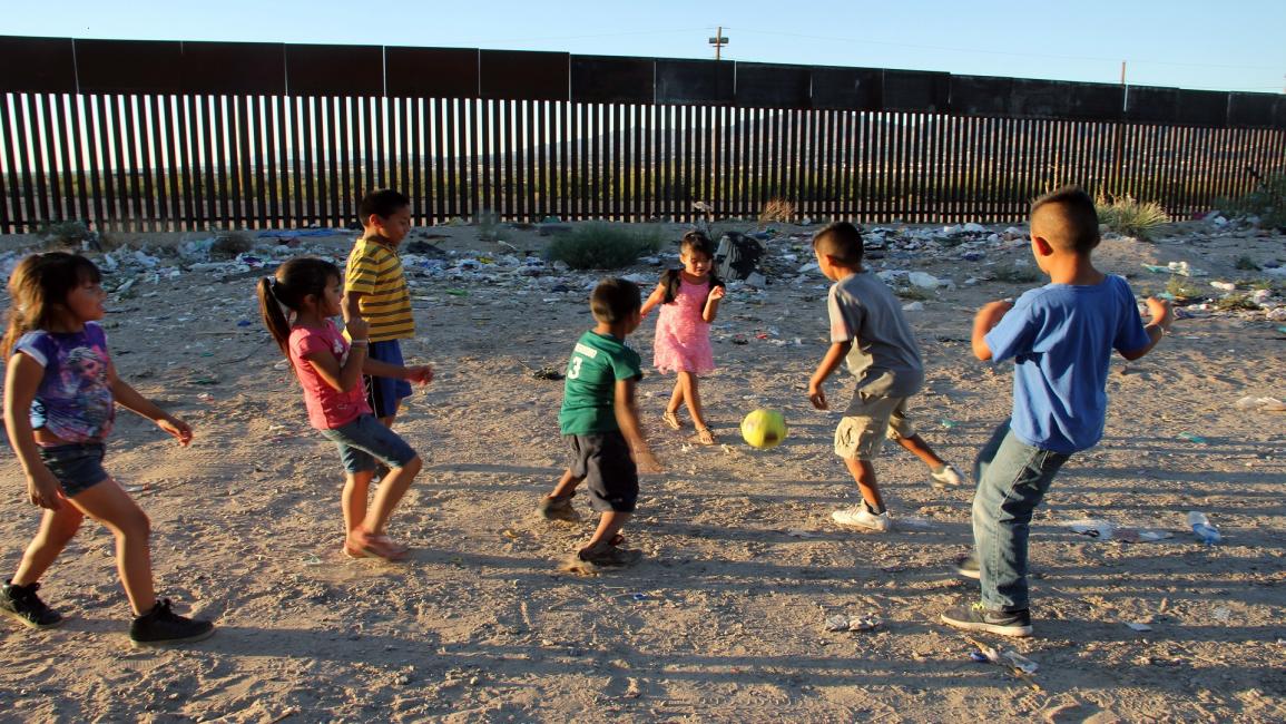 أطفال يلعبون/مجتمع (هيريكا مارتينيز/ فرانس برس)