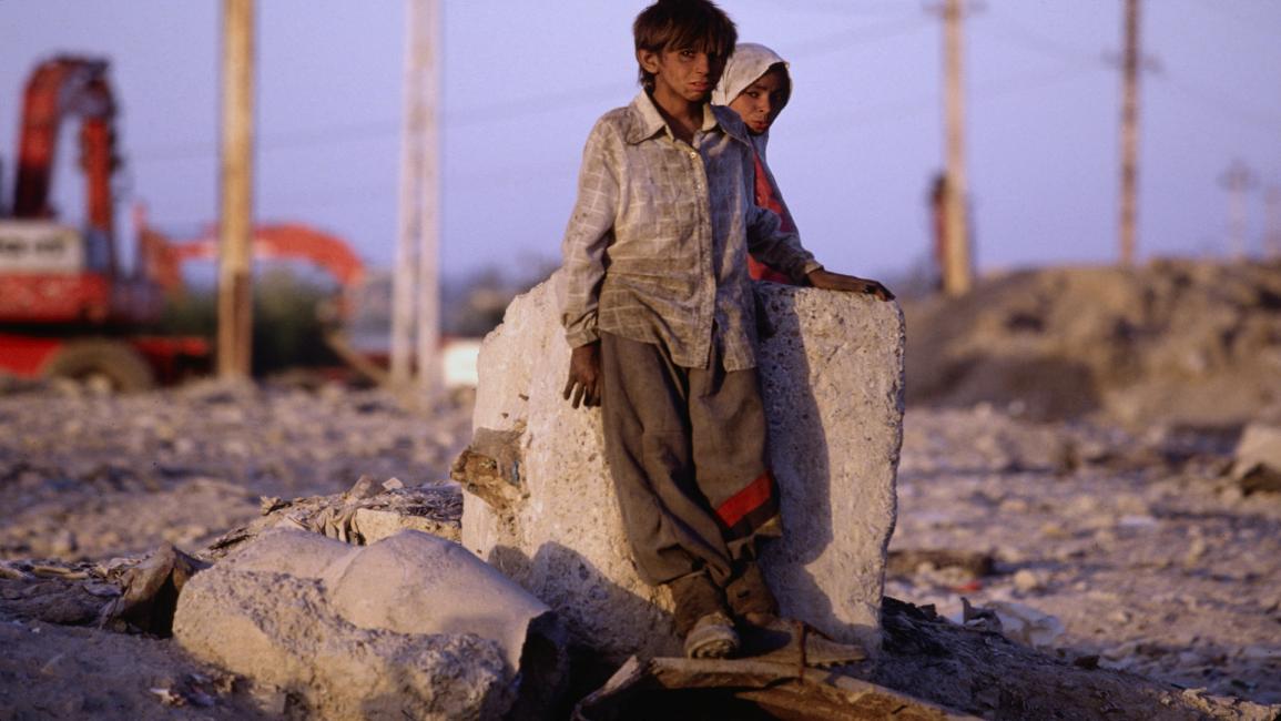 عراقيان صغيران فقيران عام 1995- Getty